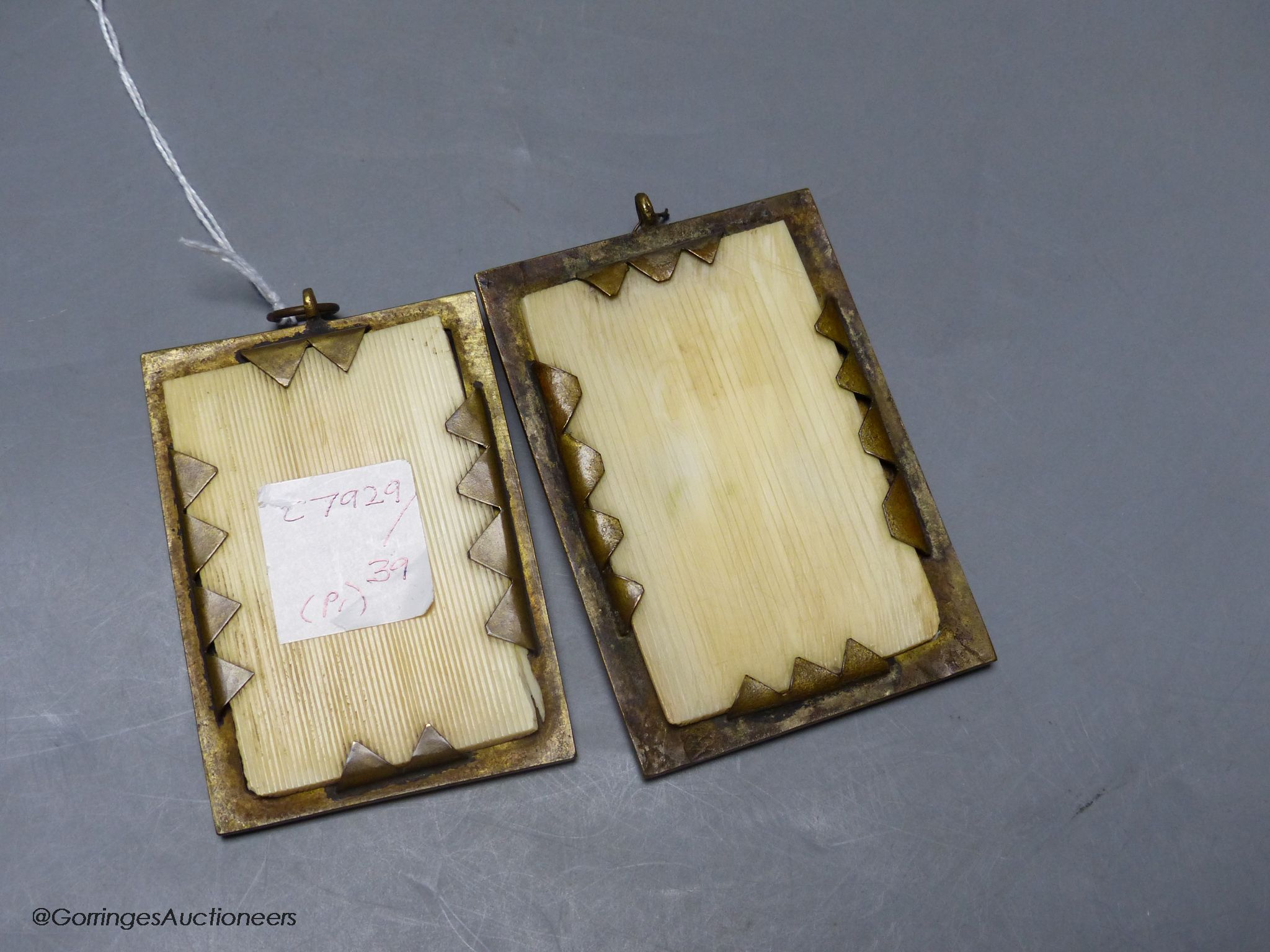A pair of 19th century carved ivory portrait reliefs, Napoleon and Louis XVIII, 6 x 8.5cm
